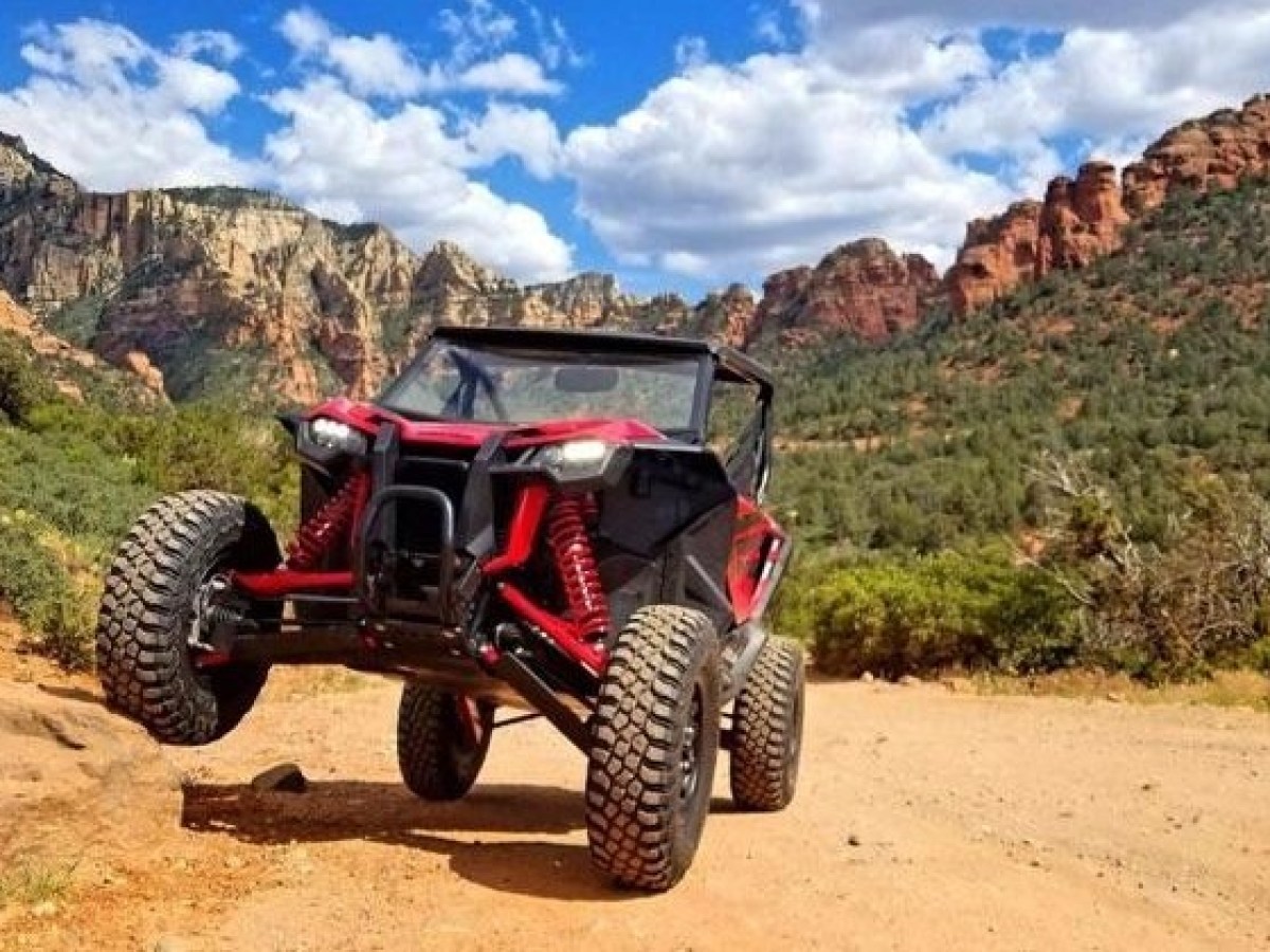 a UTV parked on the side of a mountain